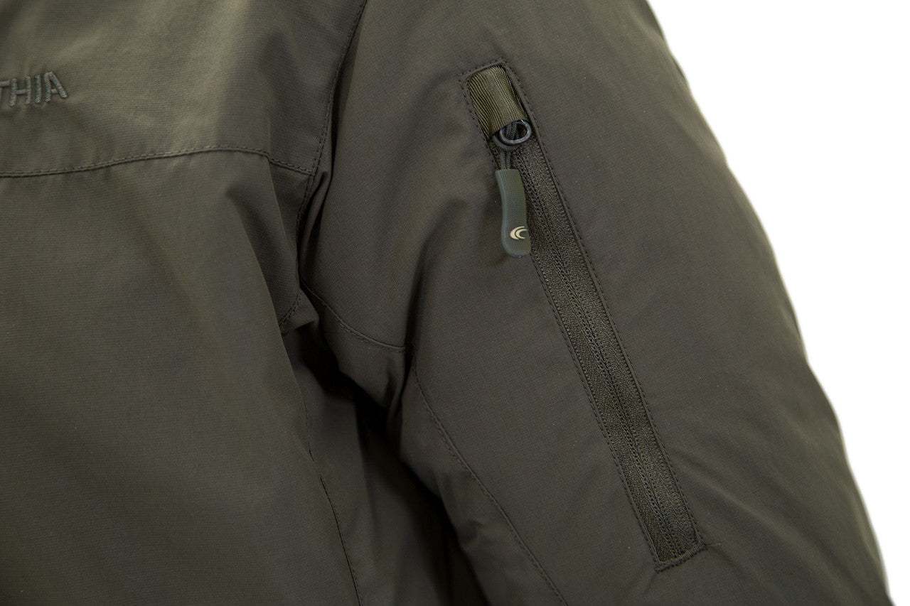 Carinthia G-Loft Windbreaker Jacket, olive color, durable Cordura fabric, sleeve zip pocket detail.