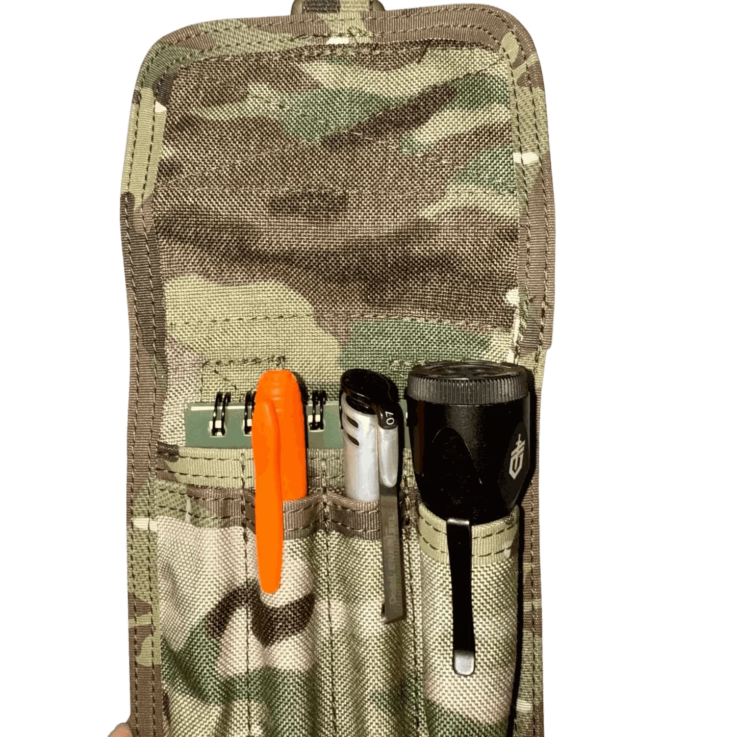 Pen pouch with MOLLE compatibility holding pens and tools, featuring camouflage fabric for tactical use.