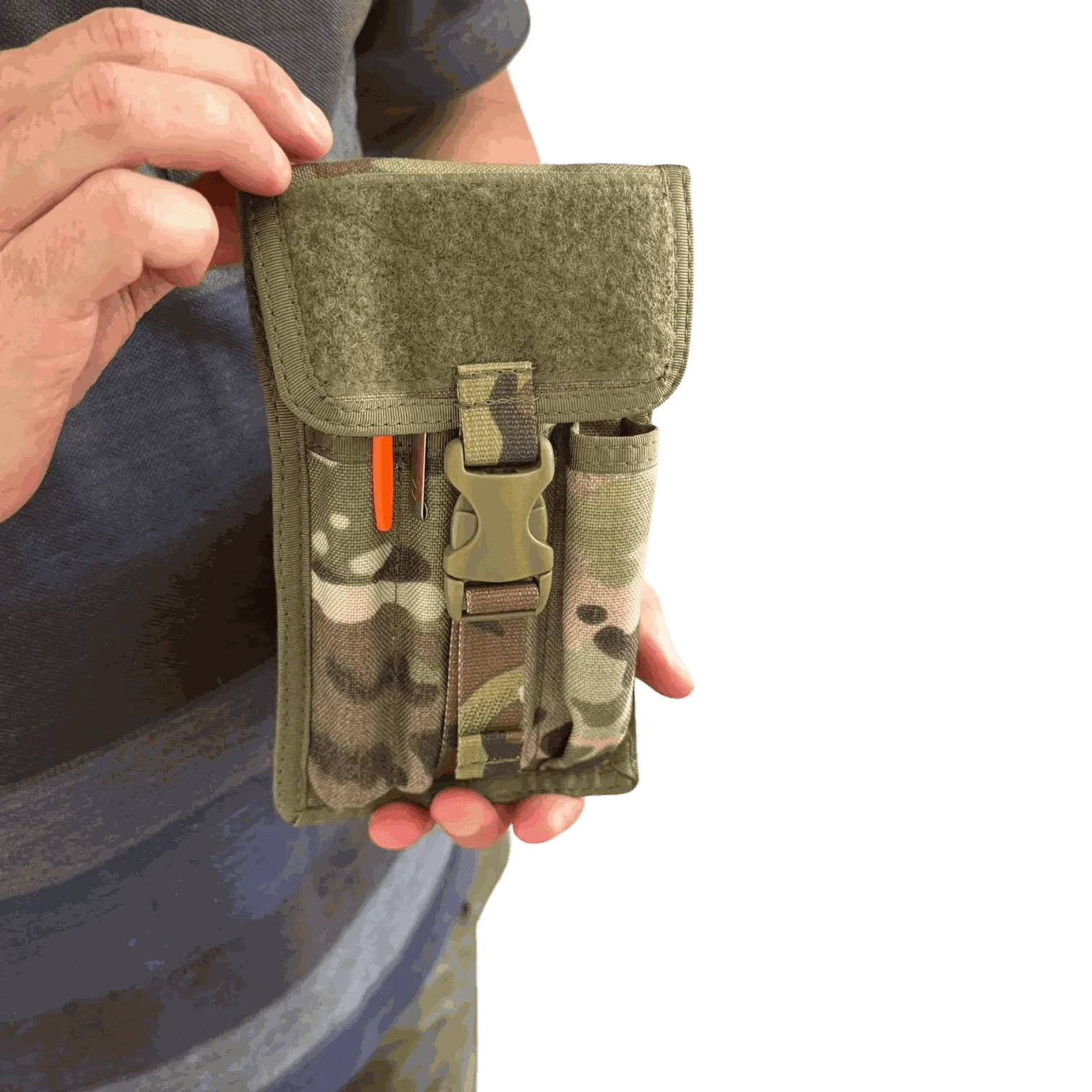 Pen pouch with MOLLE compatibility for tactical and outdoor use, waterproof and durable design, held in hand.
