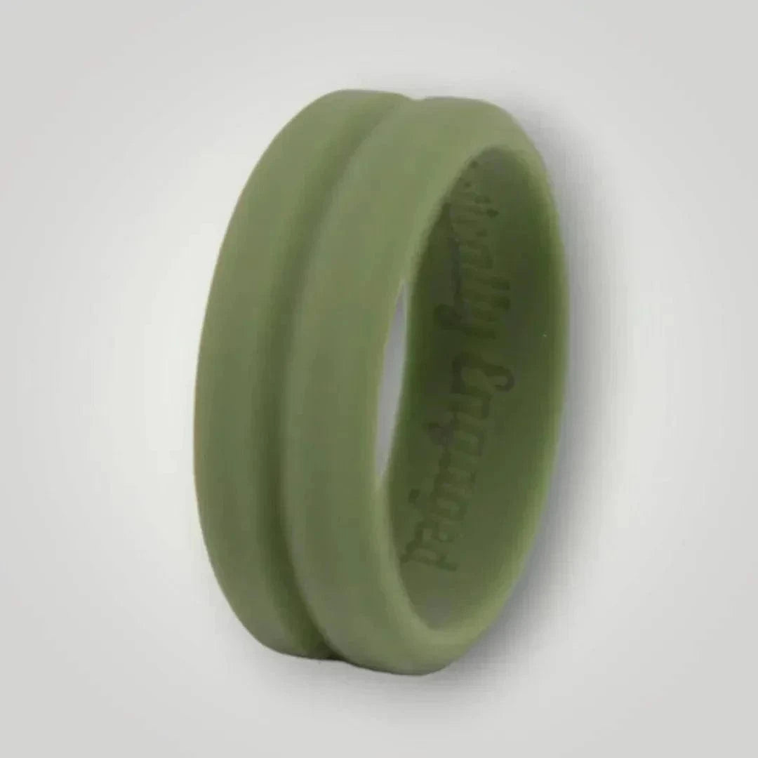 Ridged silicone ring in Ranger Green with beveled edges and a central trench, engraved with "Tactically Engaged," designed for durability and style.