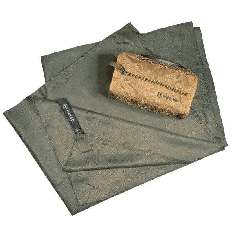 Tactical Towel by McNETT Tactical, multipurpose, super absorbent, antimicrobial, with snap loop and grommets, shown with mesh pouch.
