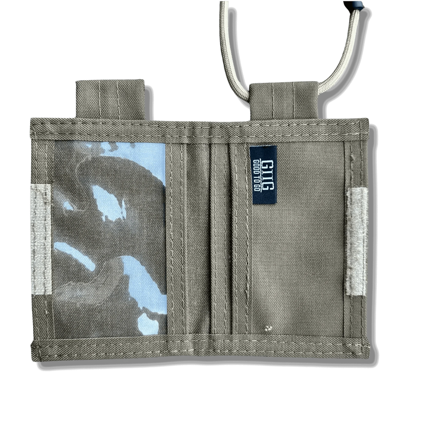 Tactical ID Holder with nylon build, versatile compartments; featuring front PVC window, back pocket, compatible with various IDs, cards, and cash.