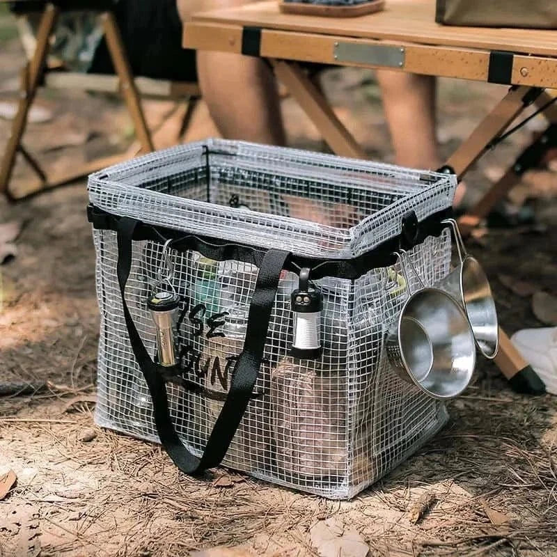 Camping Storage Bag with high-strength nylon fabric on a campsite, featuring multiple hooks and spacious compartment for organization.