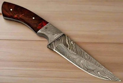 Damascus Steel Hunting Knife with pattern welded blade and wooden handle.