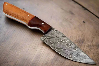 Damascus Steel Hunting Knife with wood handle and leather sheath.