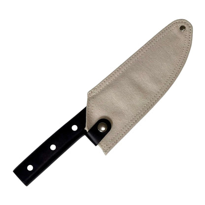 Camping knife with a protective sheath for outdoor cooking.