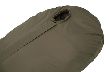Carinthia Defence 1 lightweight sleeping bag, olive green, mummy shape, with two-way center zip for ventilation and fast exit.