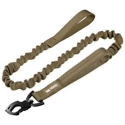Tactical bungee dog leash with Tigris Jaw metal clip for active dogs, featuring durable nylon and padded handle.