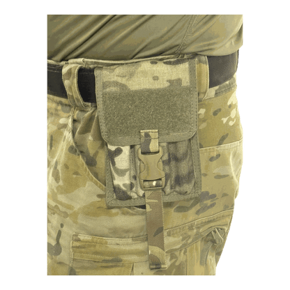 Pen Pouch with MOLLE compatibility attached to camouflage pants.