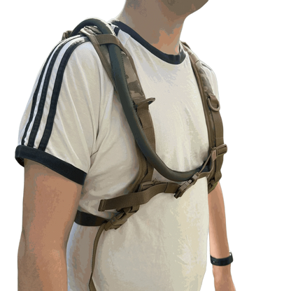 Hydration backpack worn by a person, showing adjustable straps and ergonomic design.