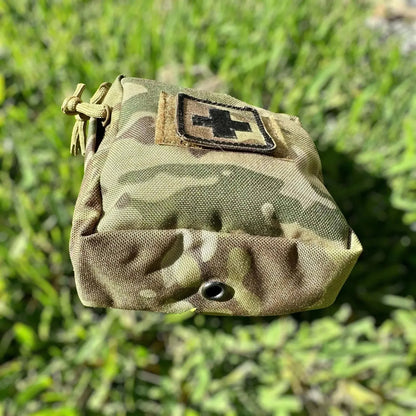 Tactical First Aid Kit in durable Multicam military-grade pouch with Velcro patch and drain hole.