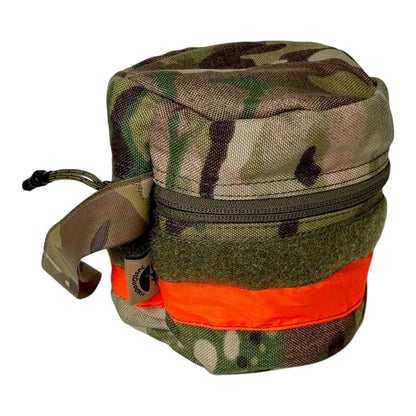 Camouflage nylon toilet roll holder with wristband and reflective tape for outdoor use.