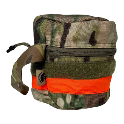 Camouflage nylon toilet roll storage holder with wristband and orange reflective tape.