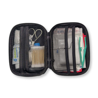 Hard shell compact first aid kit with organized medical supplies for emergencies.