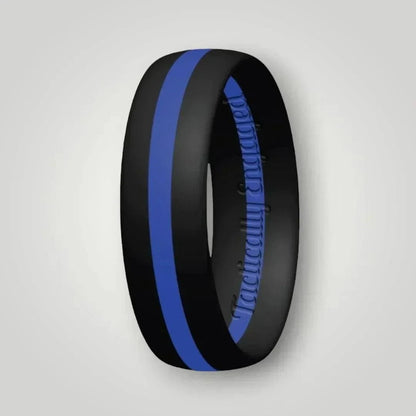 Blue stripe silicone ring with black medical-grade material, sleek modern design, and "Tactically Engaged" engraving.