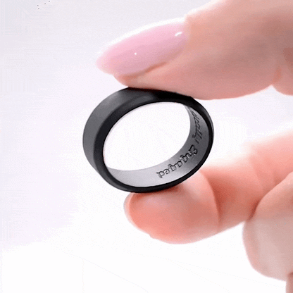 Wide bevelled black silicone ring with tactical engraved inscription.
