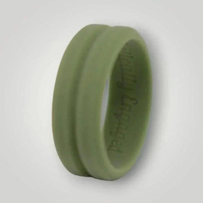 Ridged silicone ring in Ranger Green with beveled edges and a central trench, engraved with "Tactically Engaged," designed for durability and style.