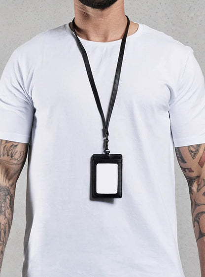 TacSource Leather ID Holder on lanyard worn by person in white shirt.