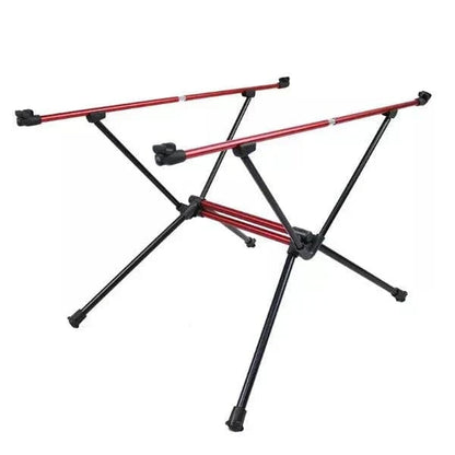 Portable camping table frame with lightweight aluminum poles and hinge design setup.