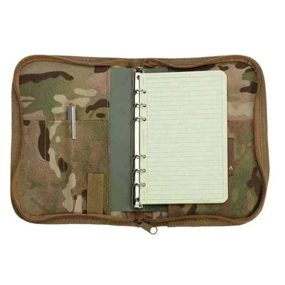 VALHALLA Rugged Folder Cover with notebook and pen, durable zip closure, camouflage design.