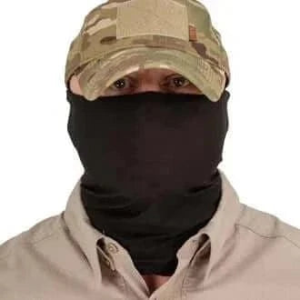 Face Wrap by Valhalla in black, worn over face and neck under a camouflage cap.