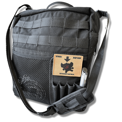 Australian Drop Bear Tactical Morale Patch on black tactical bag with Velcro attachment.