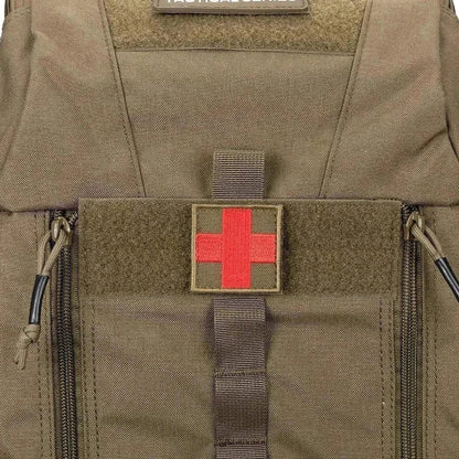 Medical backpack for survival featuring durable CORDURA material with a red cross emblem, designed for easy access to emergency supplies.