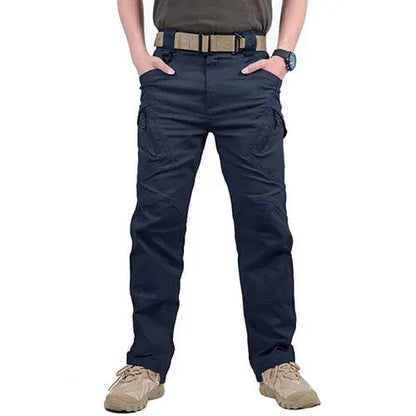 Tactical pants for men, navy blue, multiple pockets, midweight canvas, outdoor wear.