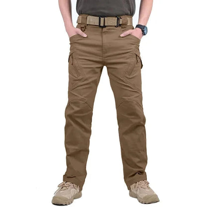 Men's tactical cargo pants in brown with multiple pockets and a secure zipper fly.