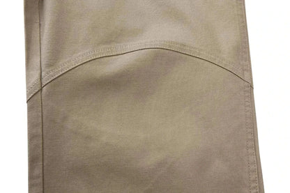 High-quality canvas material of men's tactical pants displaying durable stitching.