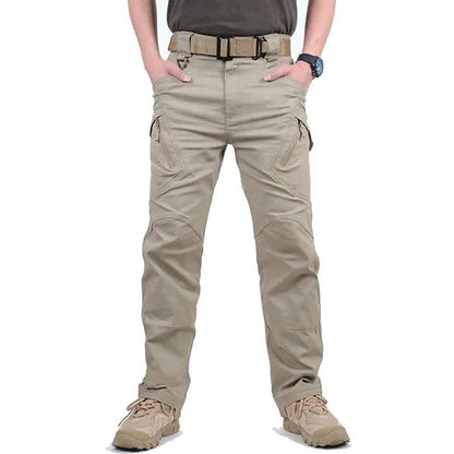 Men's tactical pants with multiple pockets, durable canvas, ideal for outdoor activities.