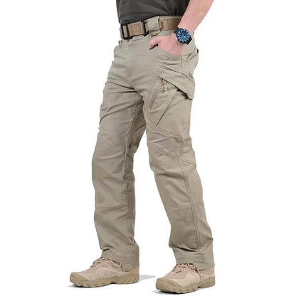 Tactical pants for men in khaki, featuring multiple pockets and a secure zipper fly.
