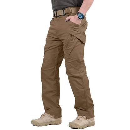 Men's tactical pants, brown cargo style, multiple pockets, outdoor wear.