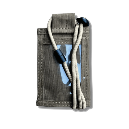 Tactical ID Holder with nylon build, versatile compartments, and parachute cord lanyard.