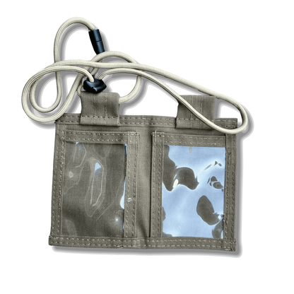 Tactical ID Holder with durable nylon build, versatile compartments, and parachute cord lanyard.