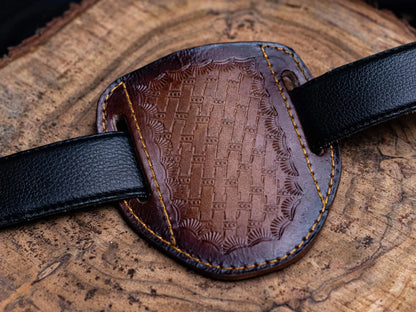 Engraved leather sheath for premium utility folding knife.