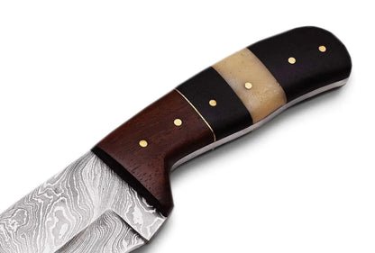 Damascus Steel Hunting Knife with Pakka Wood handle, showing intricate blade pattern and sturdy craftsmanship.