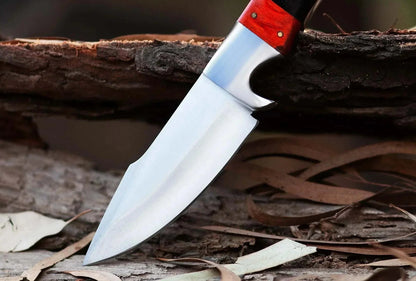 High Carbon Steel Hunting Knife with wooden handle and full tang blade.