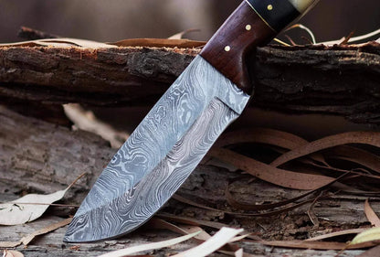 Damascus Steel Hunting Knife with handcrafted blade and Pakka Wood handle.