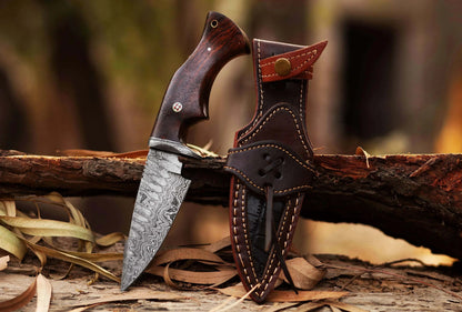 Damascus Steel Hunting Knife with Rosewood handle and leather sheath, featuring a pattern-welded blade.