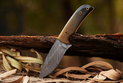 Damascus Steel Hunting Knife with horn handle, featuring a pattern welded blade, and leather sheath.