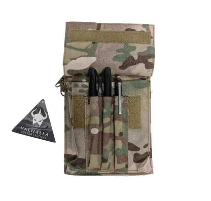 Tactical notebook cover in Multicam Cordura with pen slots and Velcro flap closure.