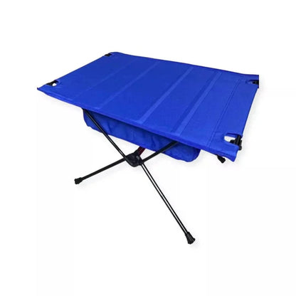 Ultra-light portable camping table in blue with a folding design, made of durable 7075 aluminum alloy and 600D Oxford cloth, ideal for outdoor use.