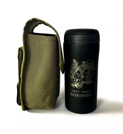 Modular Utility Pouch with black travel mug, ideal for outdoor adventures and everyday carry.