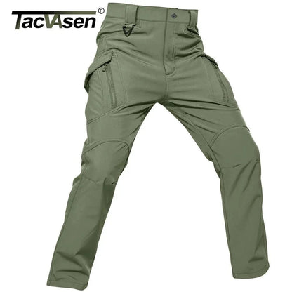 Men's tactical hiking pants with cargo pockets, green. Ideal for cold-weather adventures.