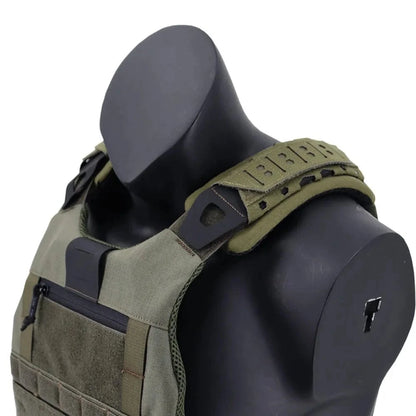 Laser-cut shoulder strap pads on a tactical vest for enhanced comfort and durability.