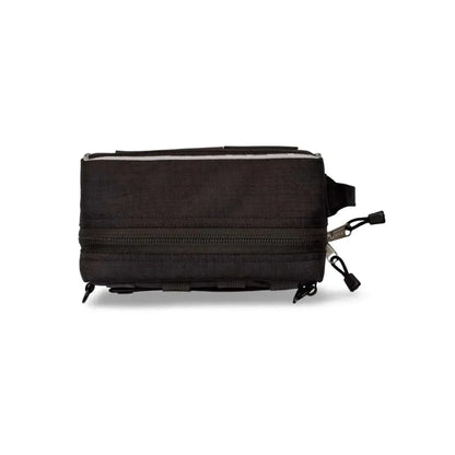 Compact black SURVIVAL Best Vehicle First Aid Kit, designed for motorists with rugged construction and MOLLE system attachment.