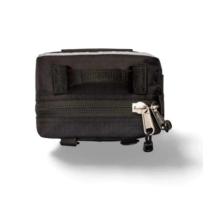 Compact black SURVIVAL Best Vehicle First Aid Kit with sturdy zippers and MOLLE system, designed for road emergencies.
