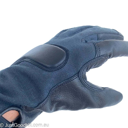Kevlar and goatskin tactical glove with Velcro wrist cuff and padded knuckles.