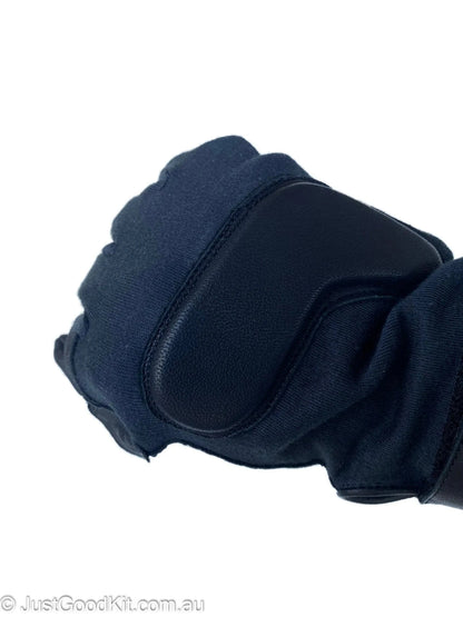 Tactical glove with Kevlar and goatskin construction for protection and comfort.